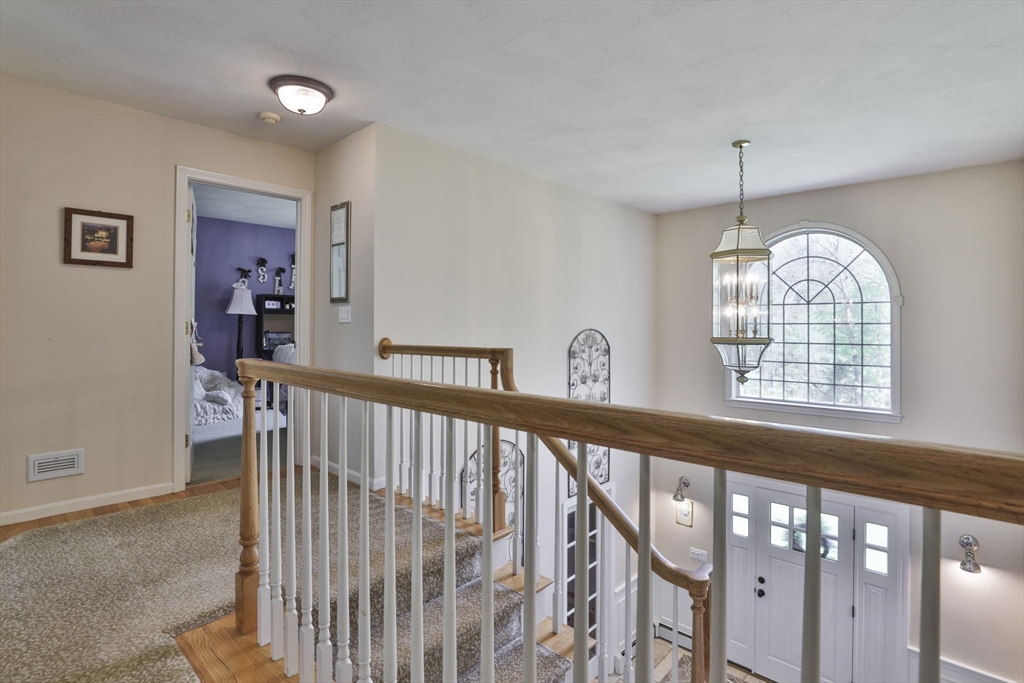 32 Glance Road Windham, NH 03087 - Photo 23 of 42 a view of entryway and hall with wooden floor