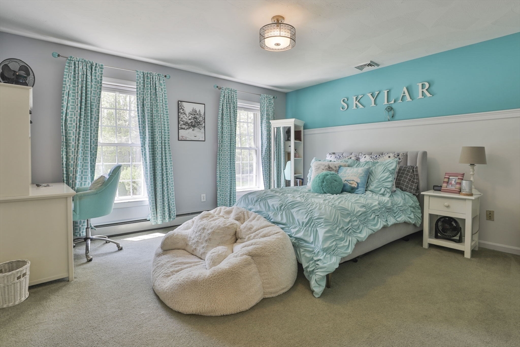 32 Glance Road Windham, NH 03087 - Photo 27 of 42 a bedroom with a bed and a couch