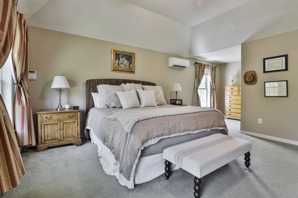 32 Glance Road Windham, NH 03087 - Photo 30 of 42 a bedroom with a bed and a night stand