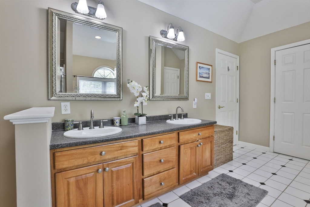 32 Glance Road Windham, NH 03087 - Photo 32 of 42 a bathroom with a double vanity sink mirror and