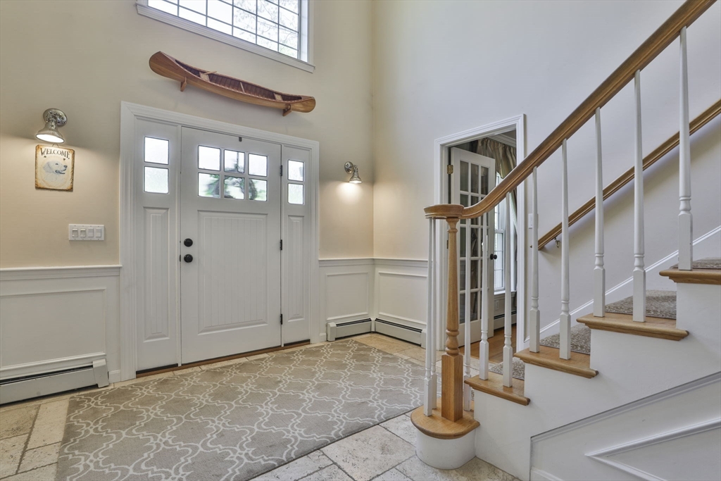 32 Glance Road Windham, NH 03087 - Photo 4 of 42 a view of entryway and hall with wooden floor