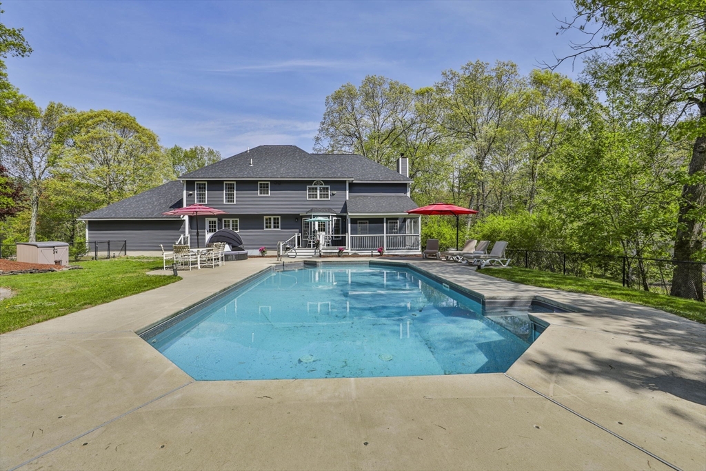 32 Glance Road Windham, NH 03087 - Photo 41 of 42 swimming pool view with a seating space and a garden view