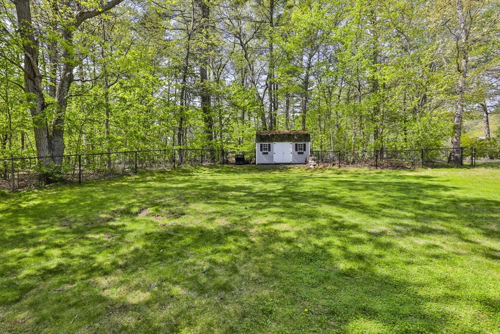 32 Glance Road Windham, NH 03087 - Photo 42 of 42 a big yard with lots of green space and trees
