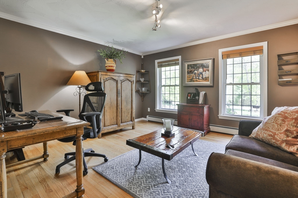 32 Glance Road Windham, NH 03087 - Photo 7 of 42 a living room with furniture and a window