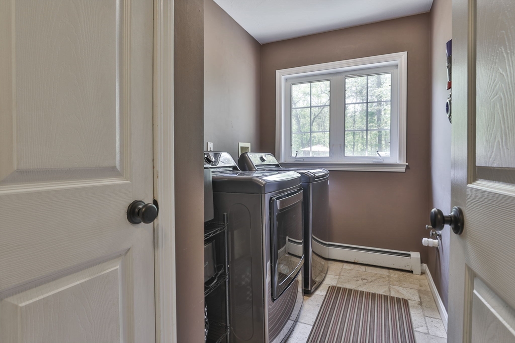 32 Glance Road Windham, NH 03087 - Photo 8 of 42 a view of a bathroom with a tub and shower
