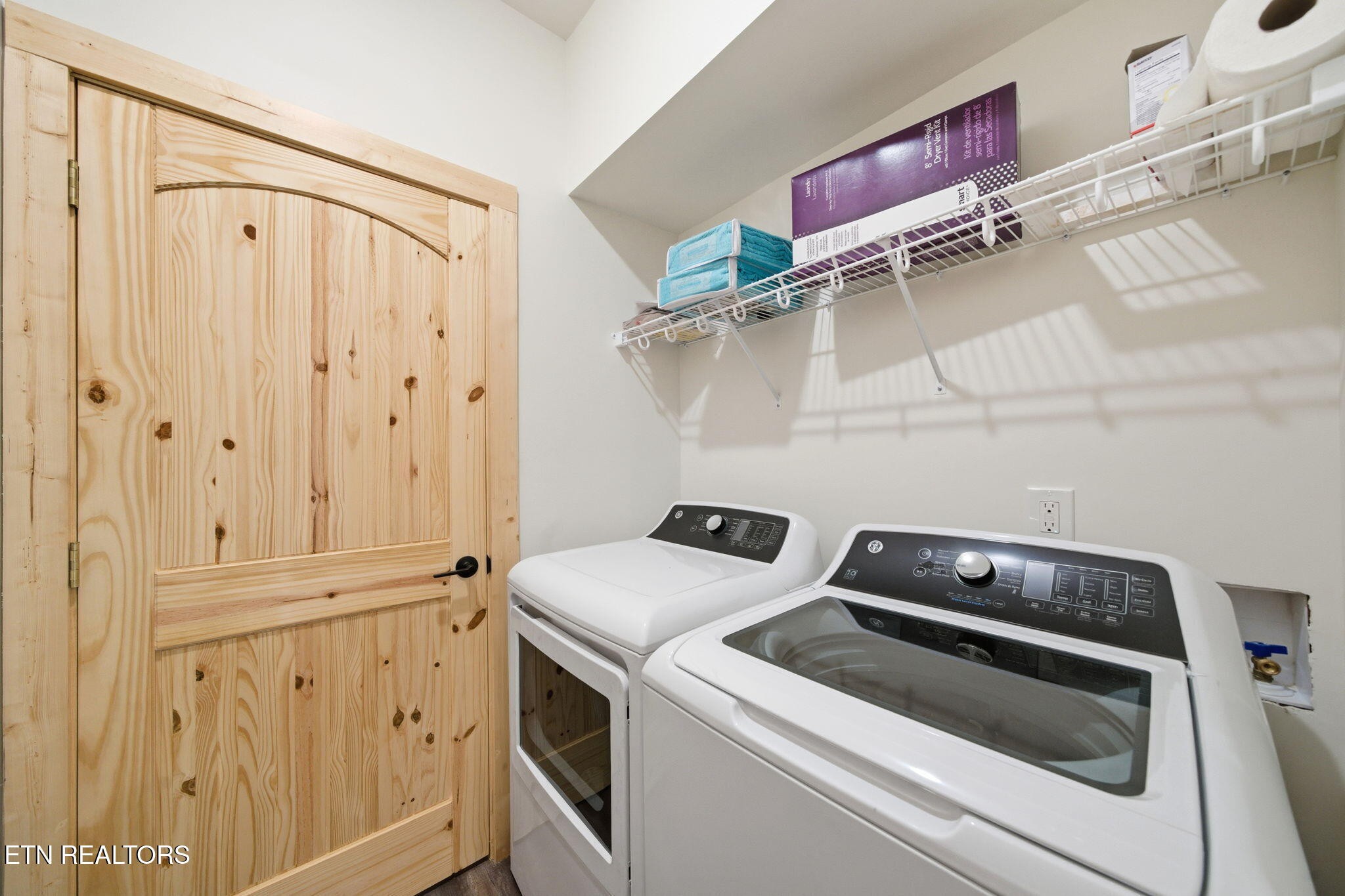 644 Ridge Top Loop Gatlinburg, TN 37738 - Photo 11 of 32 a view of storage and utility room with washer and dryer