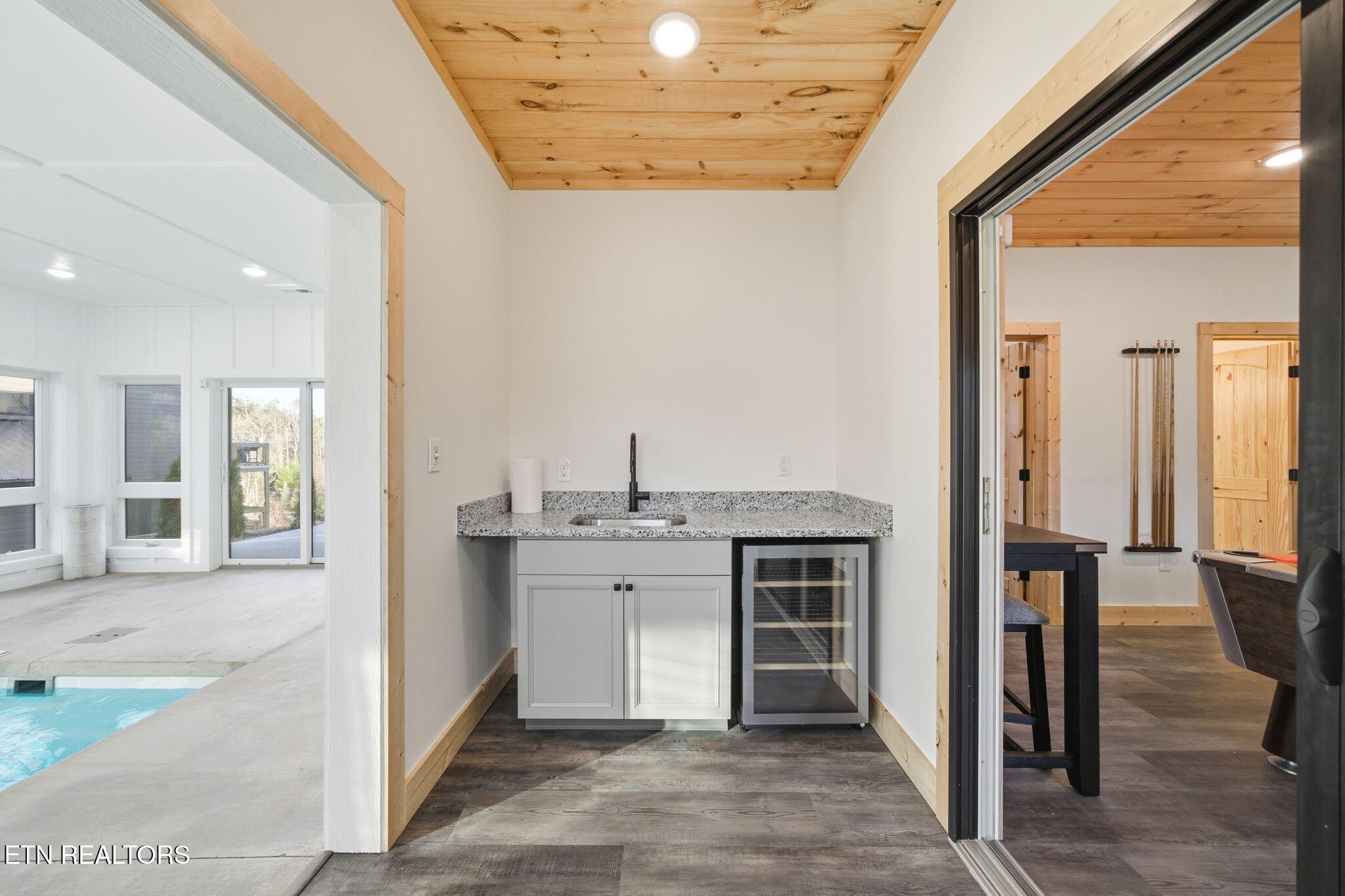 644 Ridge Top Loop Gatlinburg, TN 37738 - Photo 26 of 32 a view of a kitchen cabinets and wooden floor