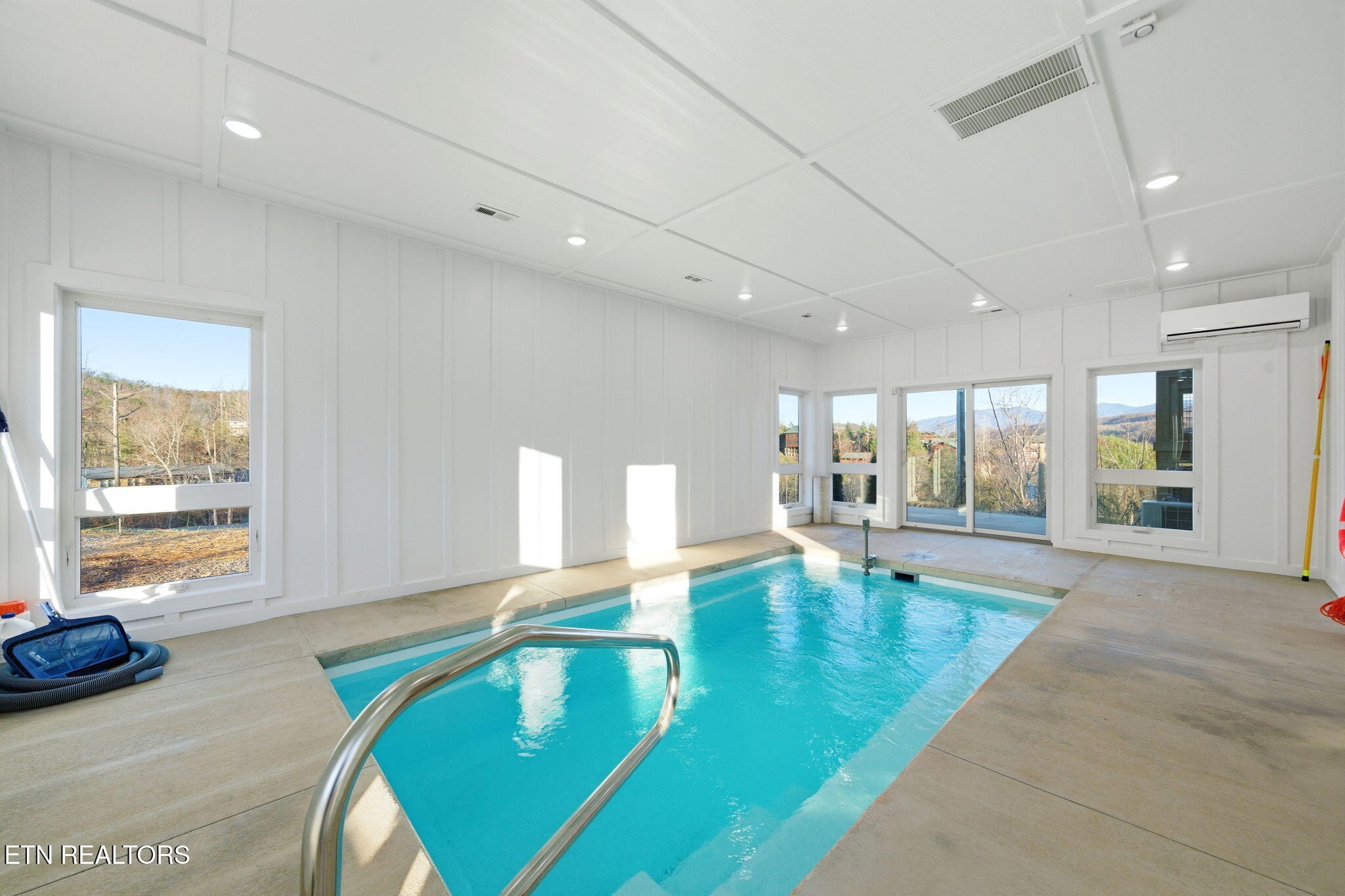 644 Ridge Top Loop Gatlinburg, TN 37738 - Photo 3 of 32 a lobby with furniture and floor to ceiling window