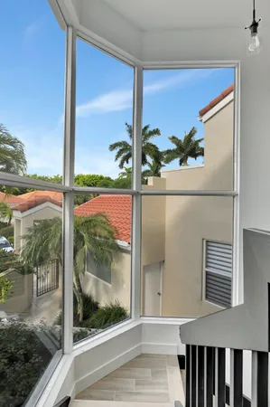 a bathroom with a double vanity sink mirror and
