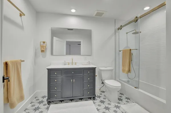 a view of a chairs and table in the balcony
