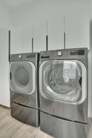 an aerial view of a house with yard swimming pool and outdoor seating