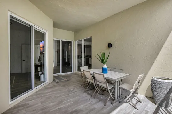 an aerial view of a house with yard
