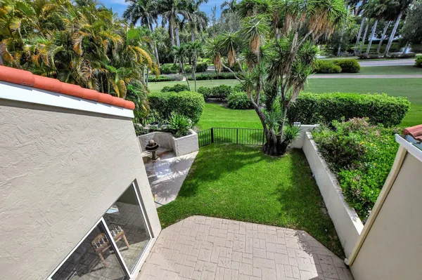 a view of a park with swings and slides