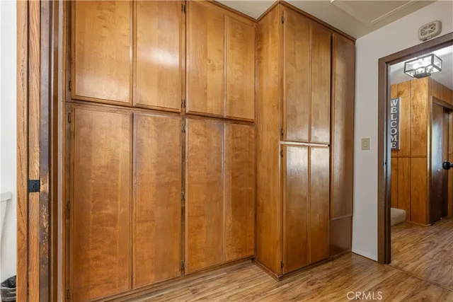 a view of a bathroom with wooden floor
