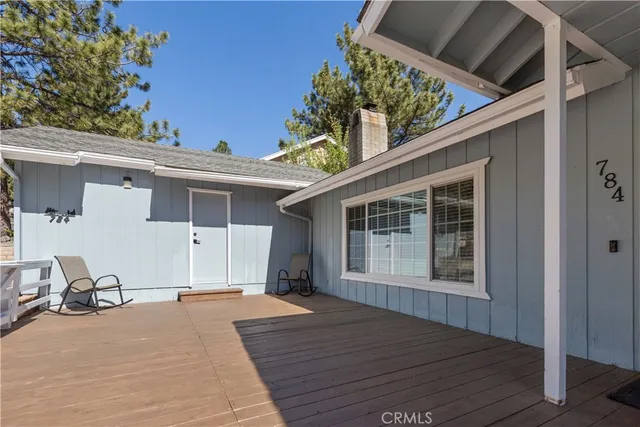 a backyard of a house with seating space