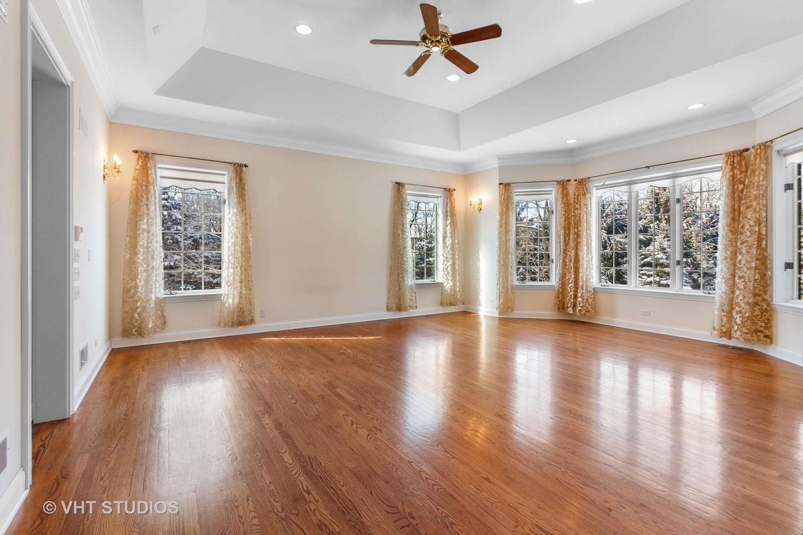 8702 Bull Valley Road Bull Valley, IL 60098 - Photo 15 of 30 a view of an empty room with wooden floor and a window