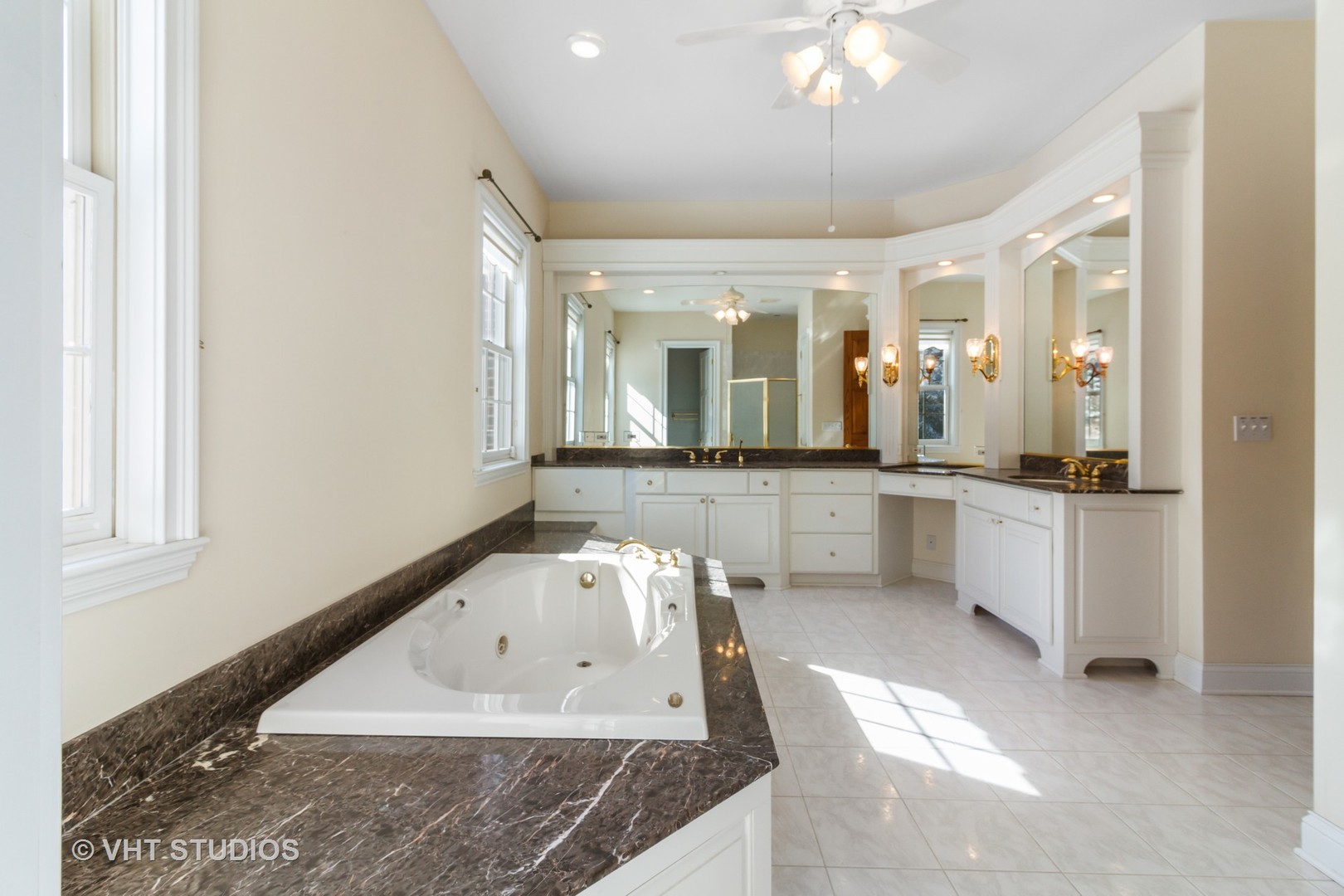 8702 Bull Valley Road Bull Valley, IL 60098 - Photo 16 of 30 a bathroom with a granite countertop sink and a mirror
