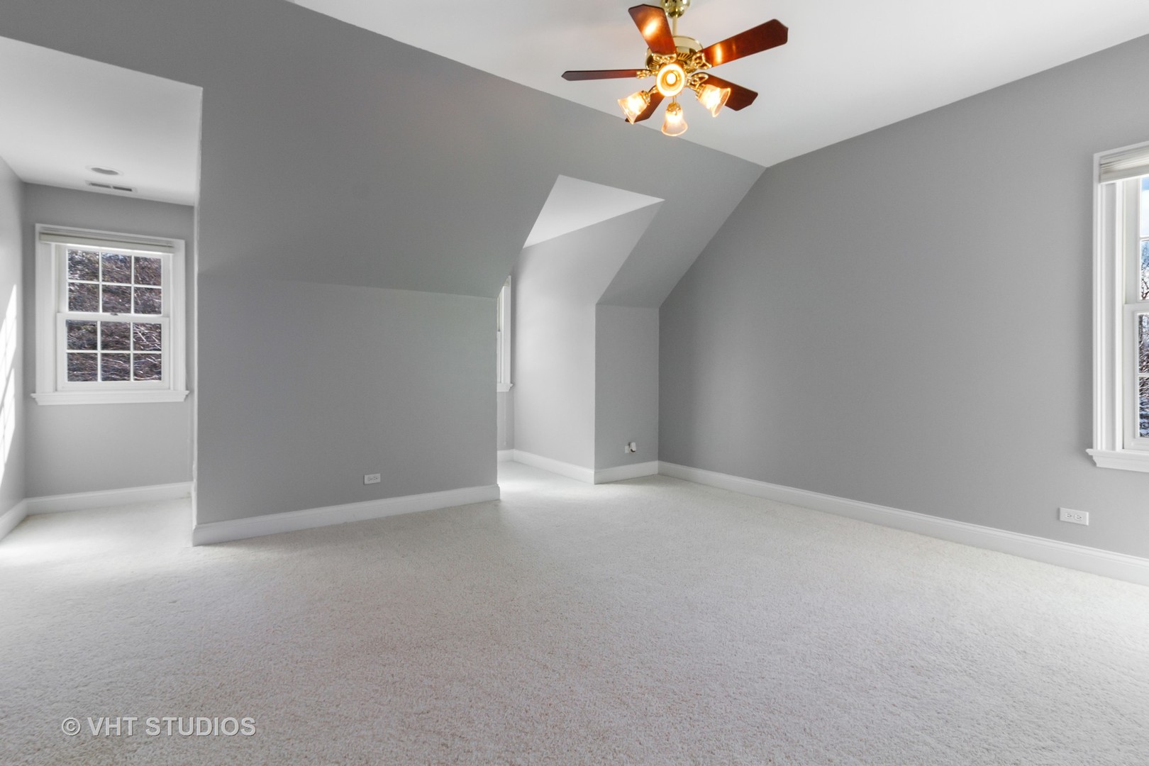8702 Bull Valley Road Bull Valley, IL 60098 - Photo 22 of 30 an empty room with a window and a chandelier fan