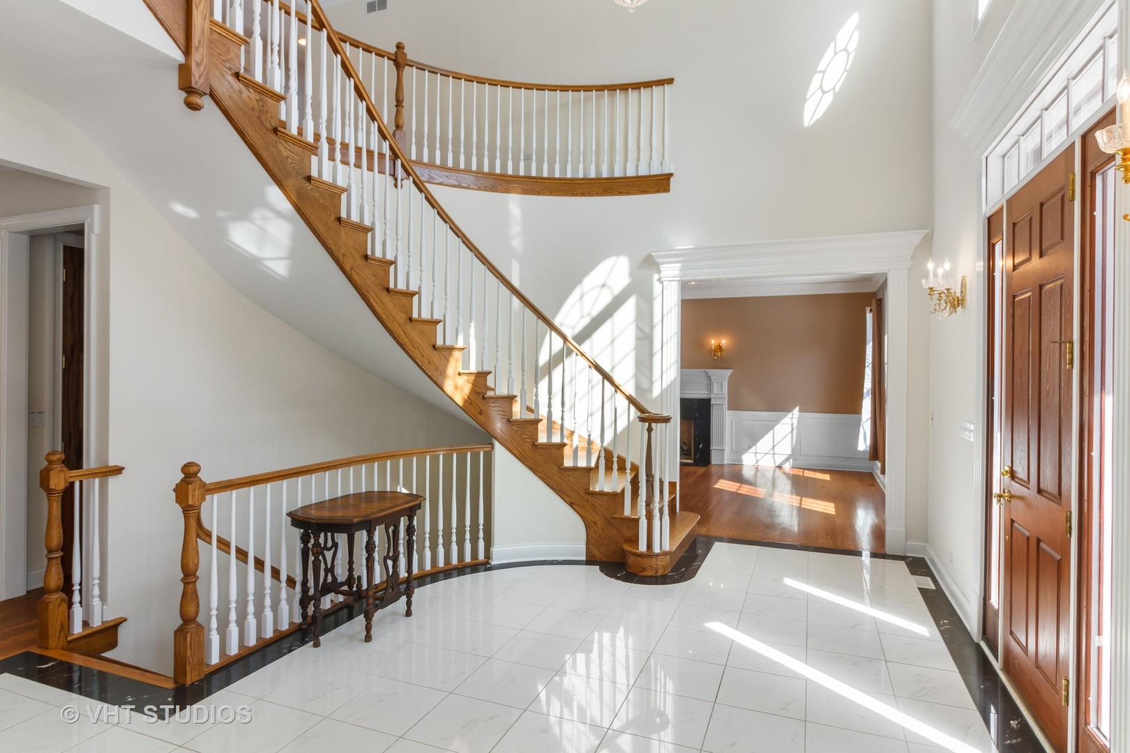 8702 Bull Valley Road Bull Valley, IL 60098 - Photo 5 of 30 a view of staircase with wooden floor and a large window