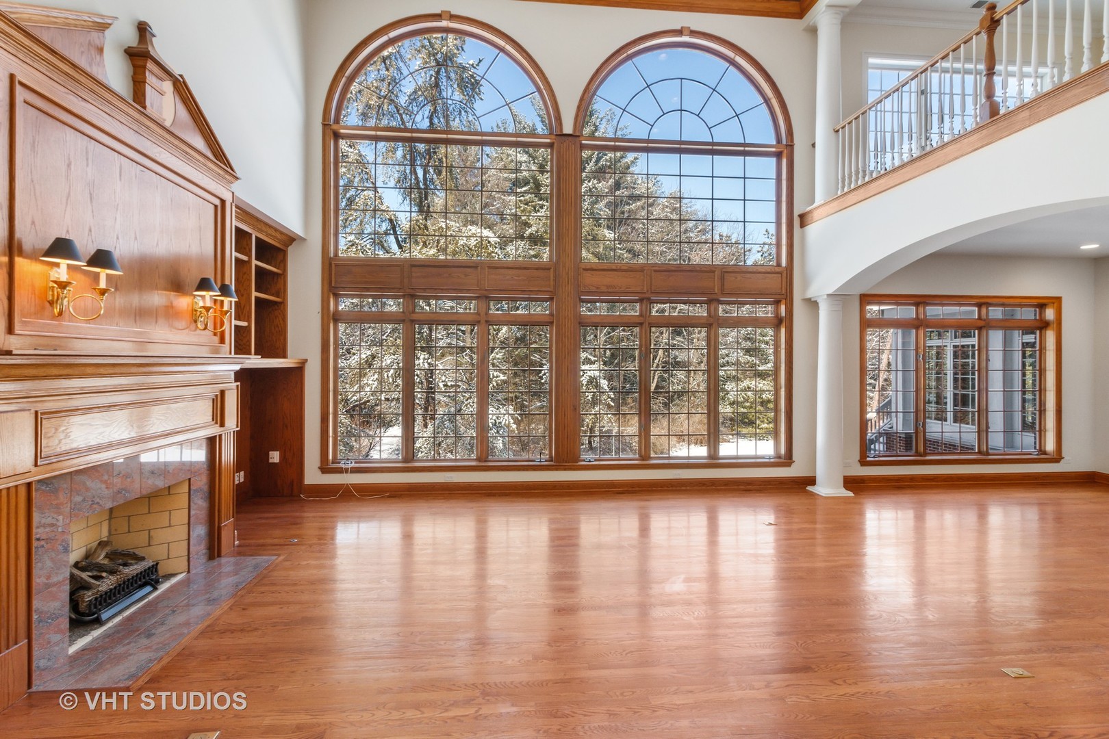 8702 Bull Valley Road Bull Valley, IL 60098 - Photo 6 of 30 a view of hall way with furniture and a fireplace