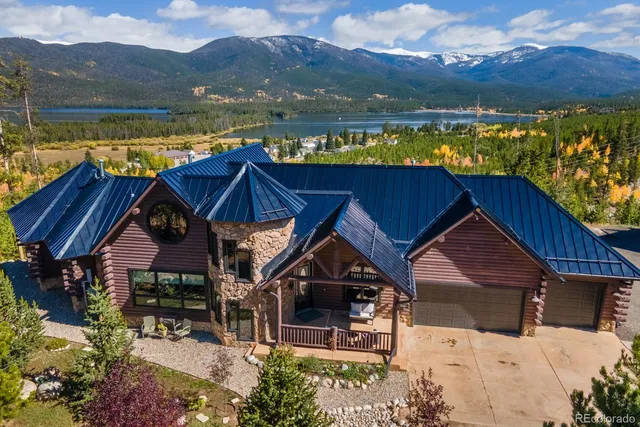 a view of a house with a ocean view