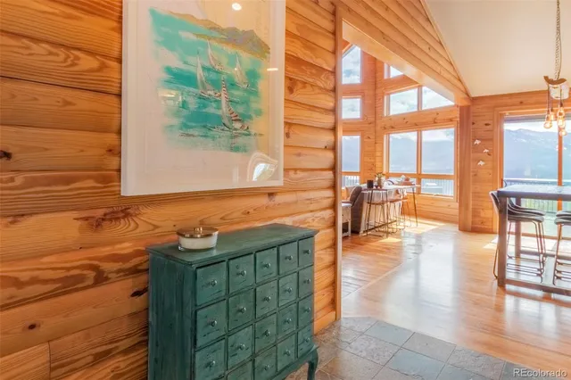 a spacious bathroom with a bathtub and 2 sink