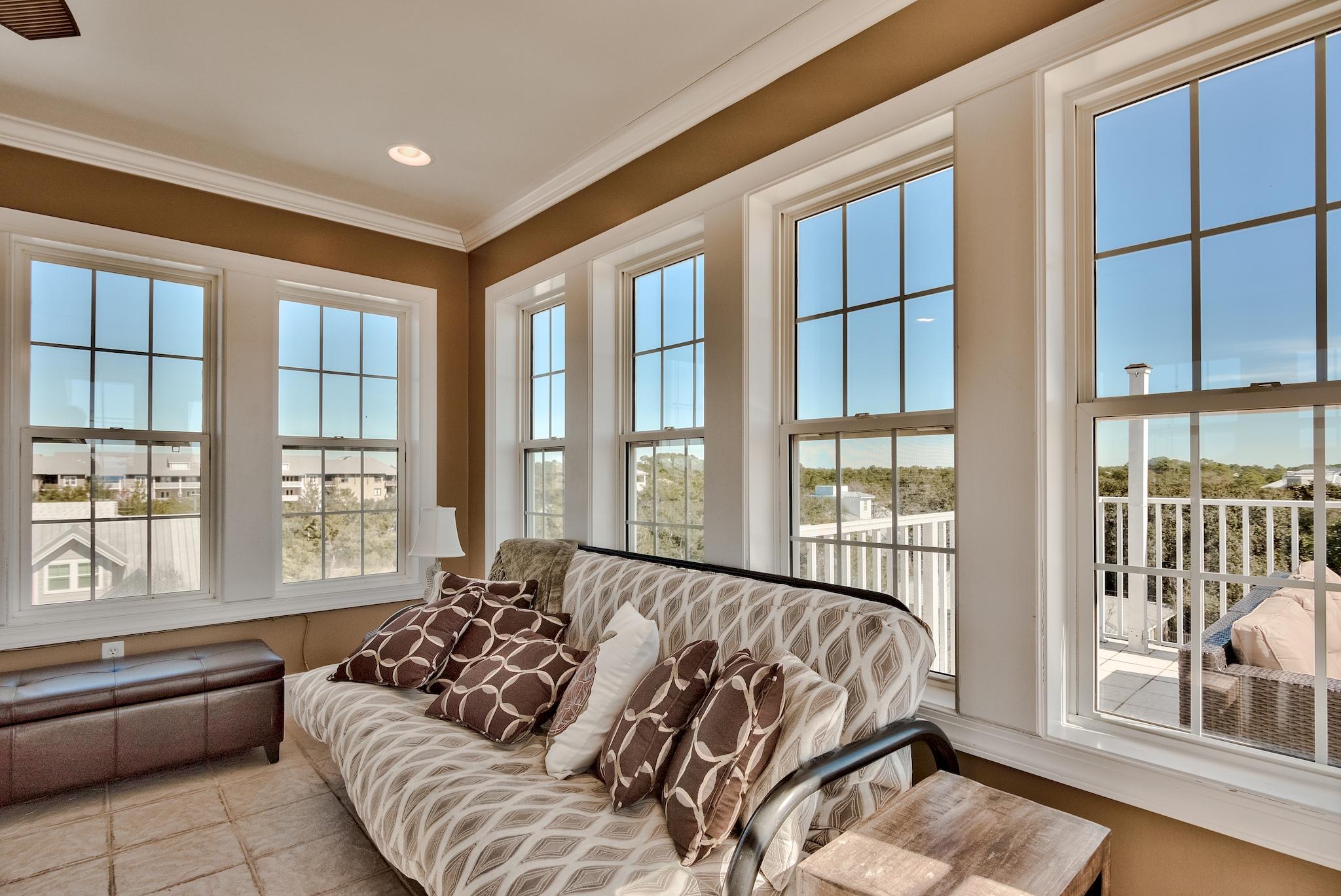 98 Gulf Point Road Santa Rosa Beach, FL 32459 - Photo 50 of 75 a bed sitting in a spacious bedroom next to a large window