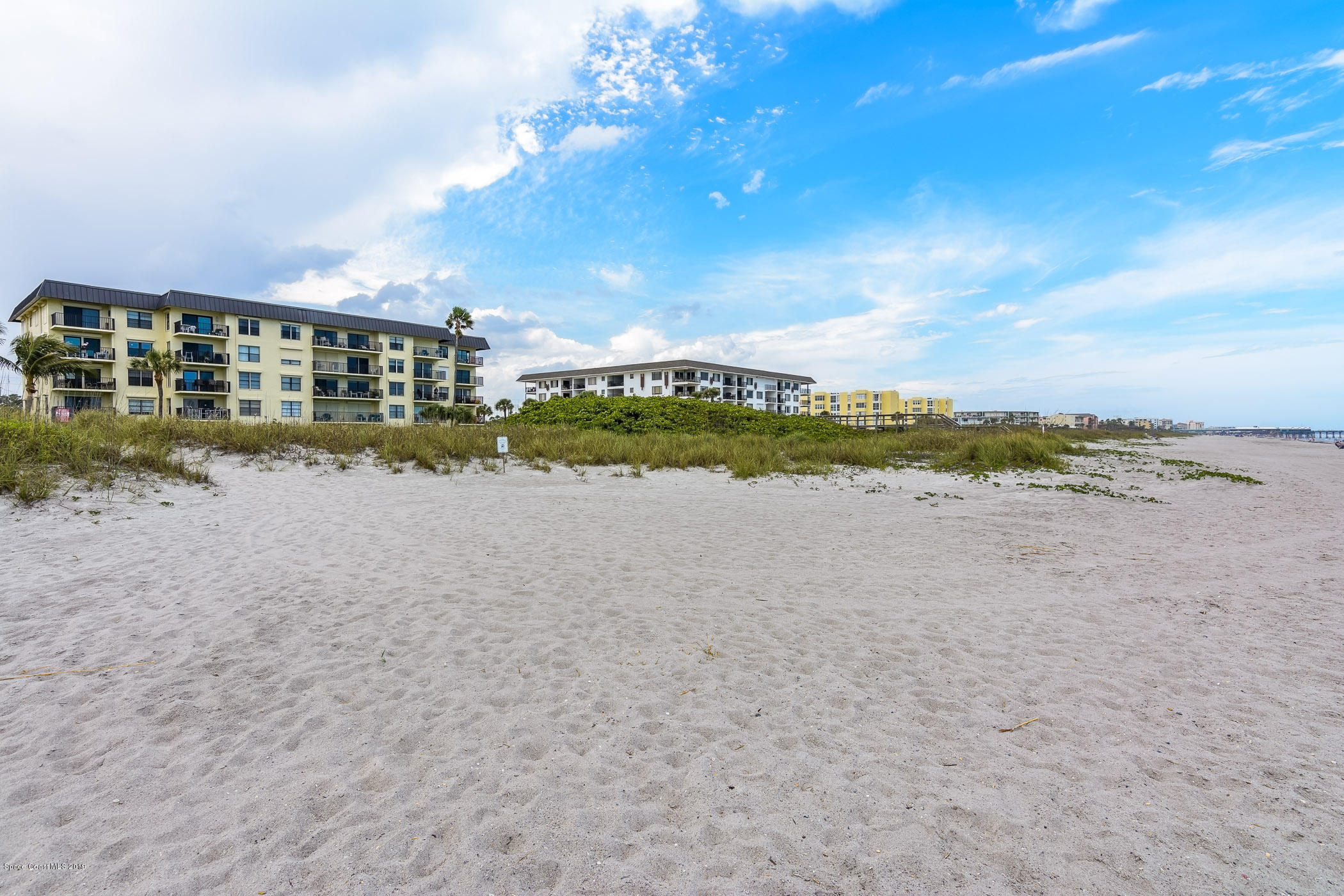 4570 Ocean Beach Boulevard, Unit 106 Cocoa Beach, FL 32931 - Photo 18 of 39 a view of building with ocean view