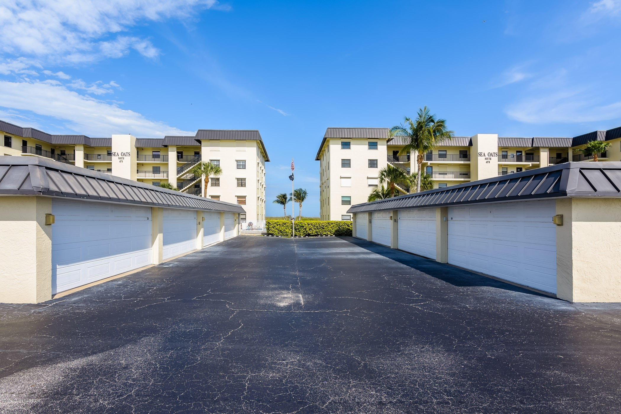 4570 Ocean Beach Boulevard, Unit 106 Cocoa Beach, FL 32931 - Photo 20 of 39 a view of a house with a roof deck