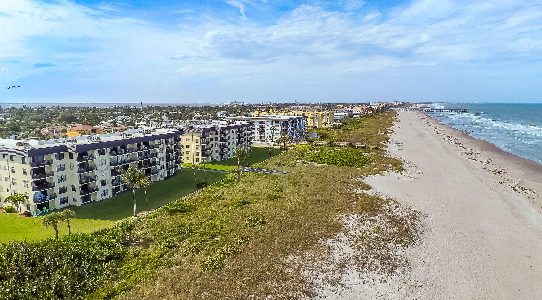 4570 Ocean Beach Boulevard, Unit 106 Cocoa Beach, FL 32931 - Photo 28 of 39 a view of a lake with houses