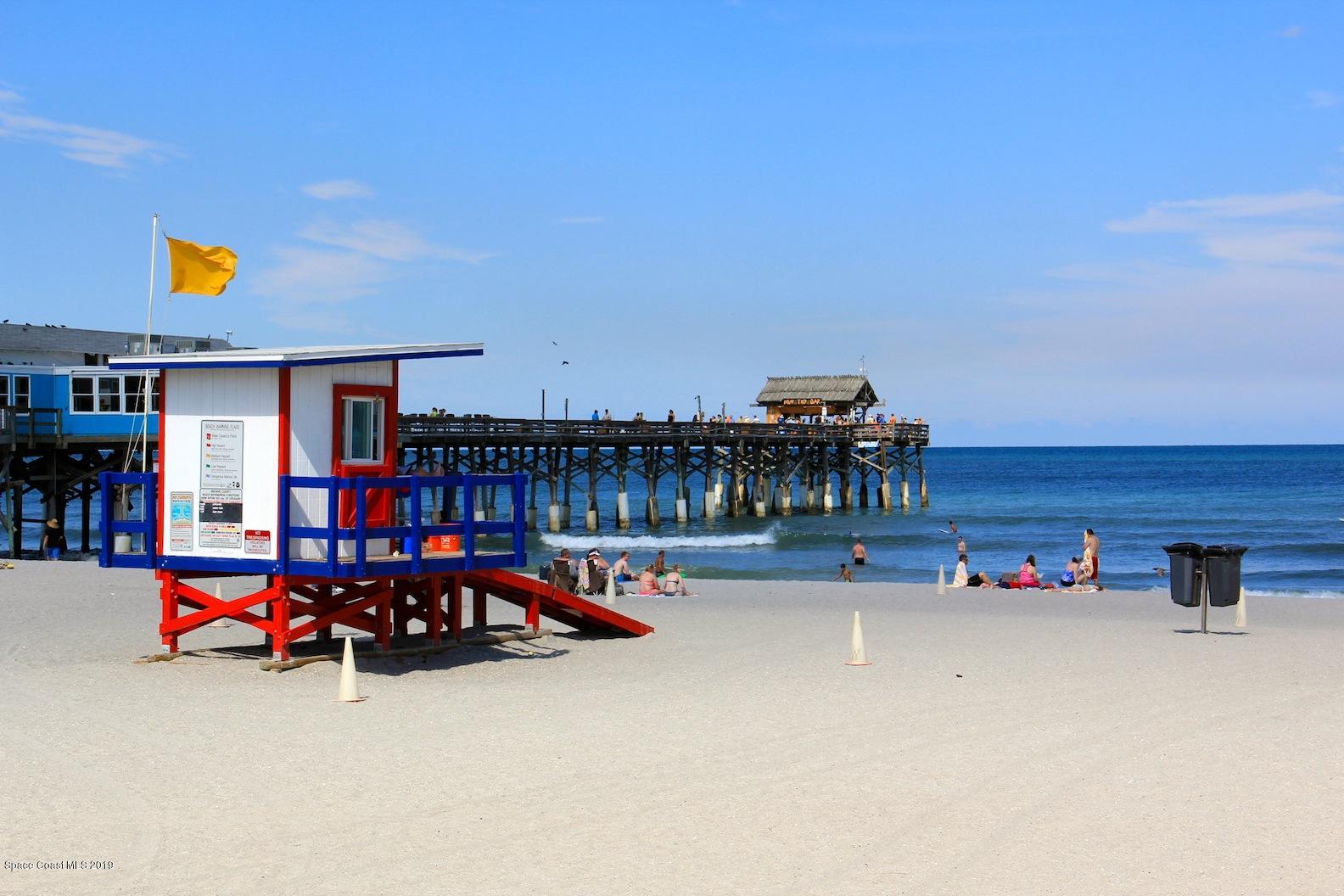 4570 Ocean Beach Boulevard, Unit 106 Cocoa Beach, FL 32931 - Photo 31 of 39 an outdoor space with furniture