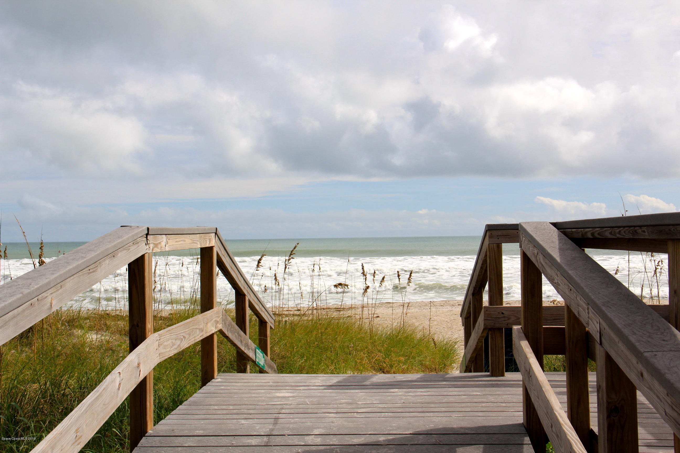 4570 Ocean Beach Boulevard, Unit 106 Cocoa Beach, FL 32931 - Photo 36 of 39 a view of balcony with furniture