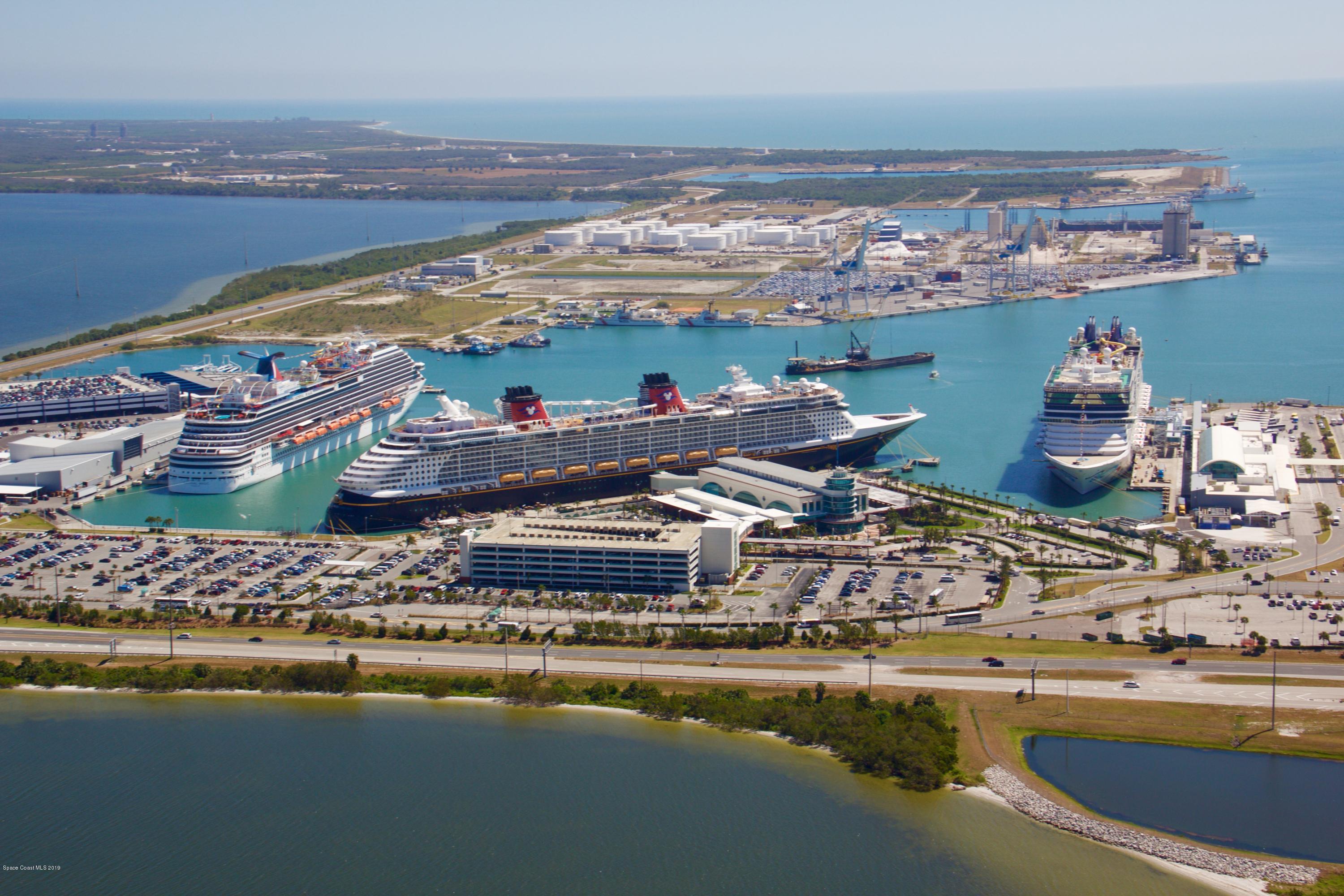 4570 Ocean Beach Boulevard, Unit 106 Cocoa Beach, FL 32931 - Photo 37 of 39 a view of a swimming pool with an ocean view