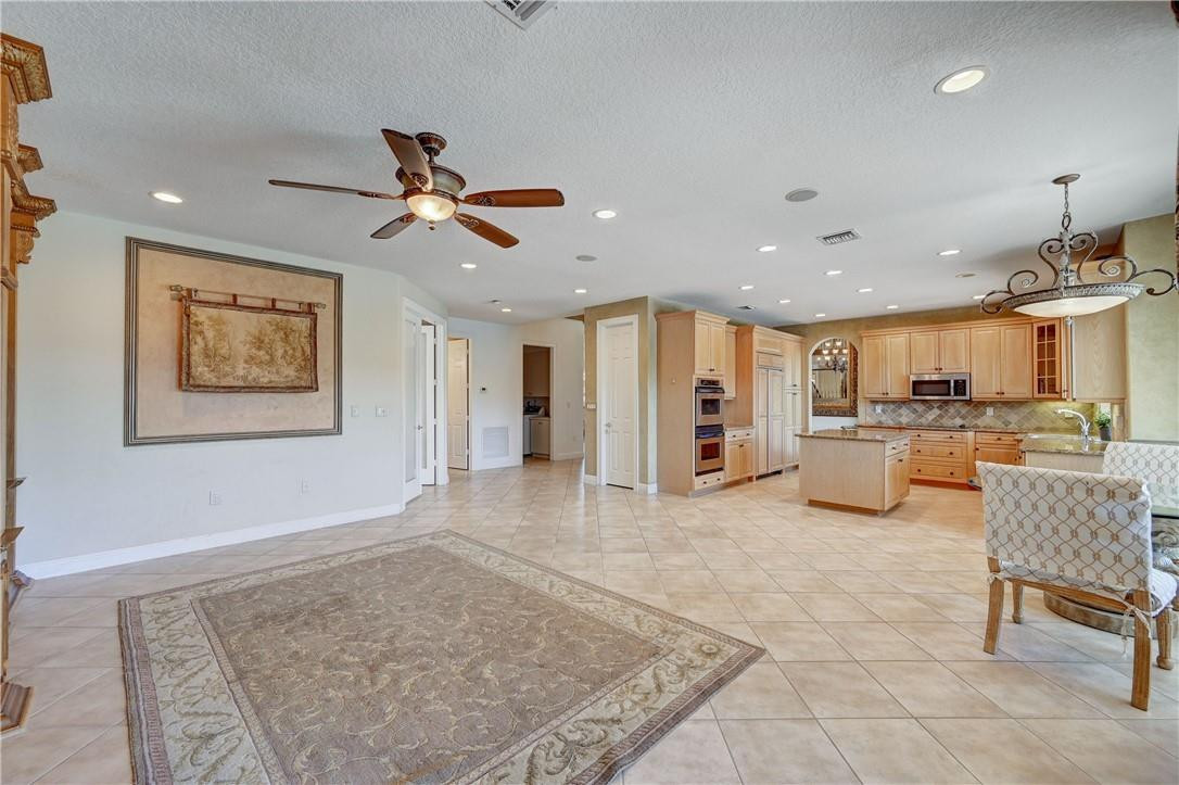 19168 Skyridge Circle Boca Raton, FL 33498 - Photo 11 of 55 a view of a living room and kitchen