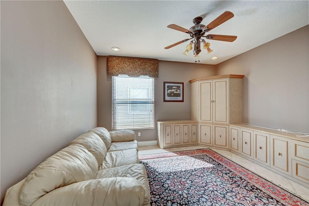 19168 Skyridge Circle Boca Raton, FL 33498 - Photo 18 of 55 a living room with furniture and a window