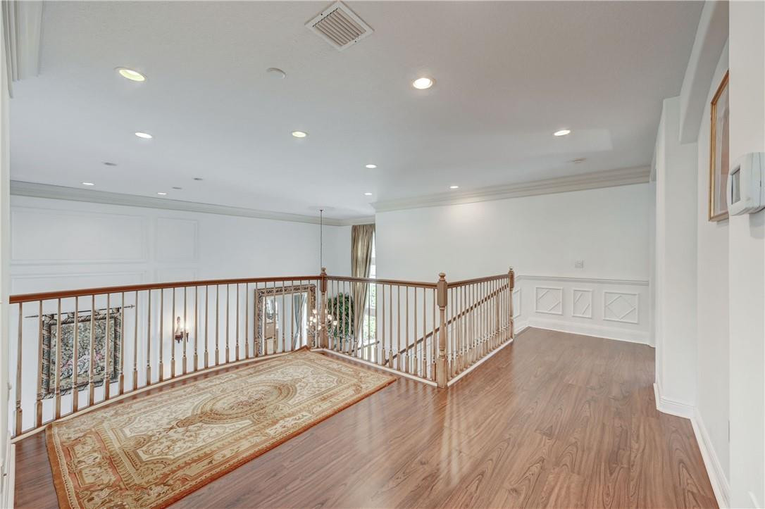 19168 Skyridge Circle Boca Raton, FL 33498 - Photo 22 of 55 a view of a hallway with wooden floor