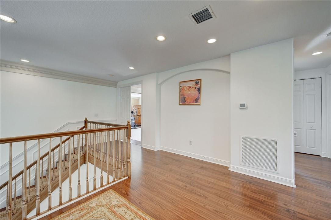 19168 Skyridge Circle Boca Raton, FL 33498 - Photo 23 of 55 a view of hallway with wooden floor