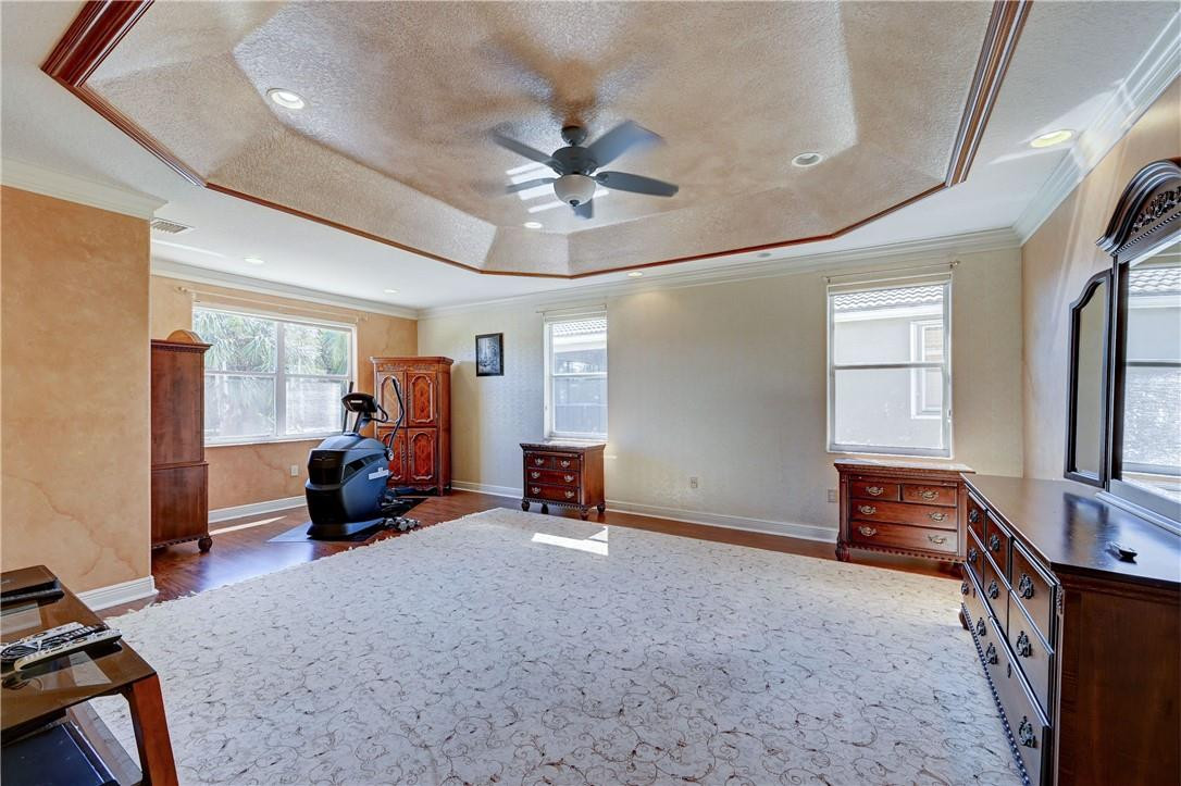 19168 Skyridge Circle Boca Raton, FL 33498 - Photo 24 of 55 a view of a livingroom with furniture and a ceiling fan
