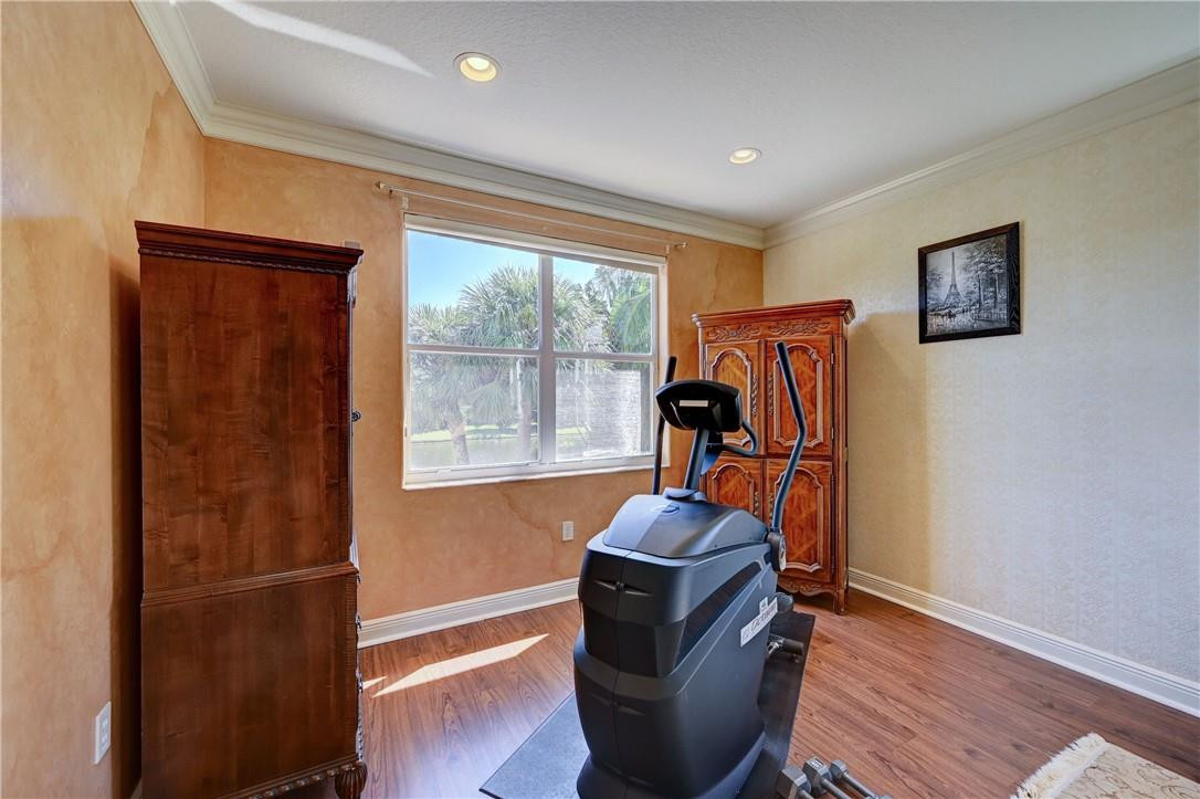 19168 Skyridge Circle Boca Raton, FL 33498 - Photo 28 of 55 a room with furniture and wooden floor