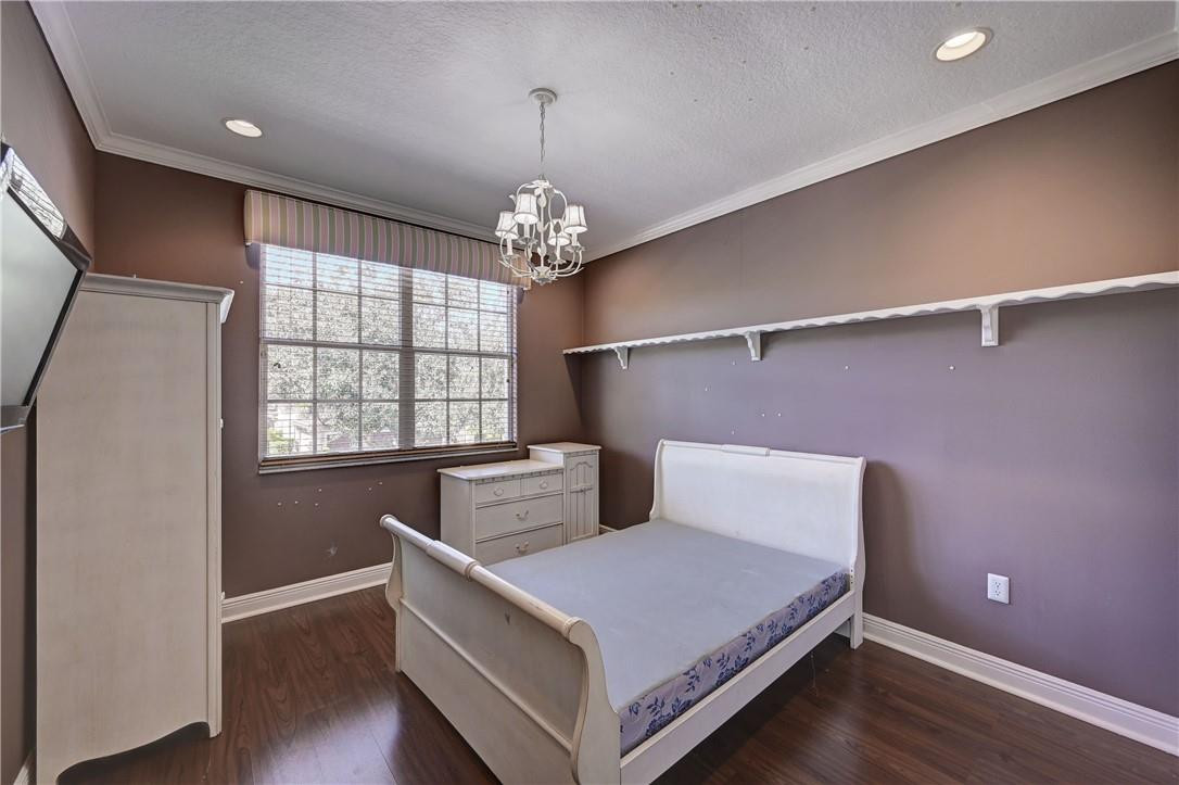 19168 Skyridge Circle Boca Raton, FL 33498 - Photo 33 of 55 a bedroom with a bed and a window