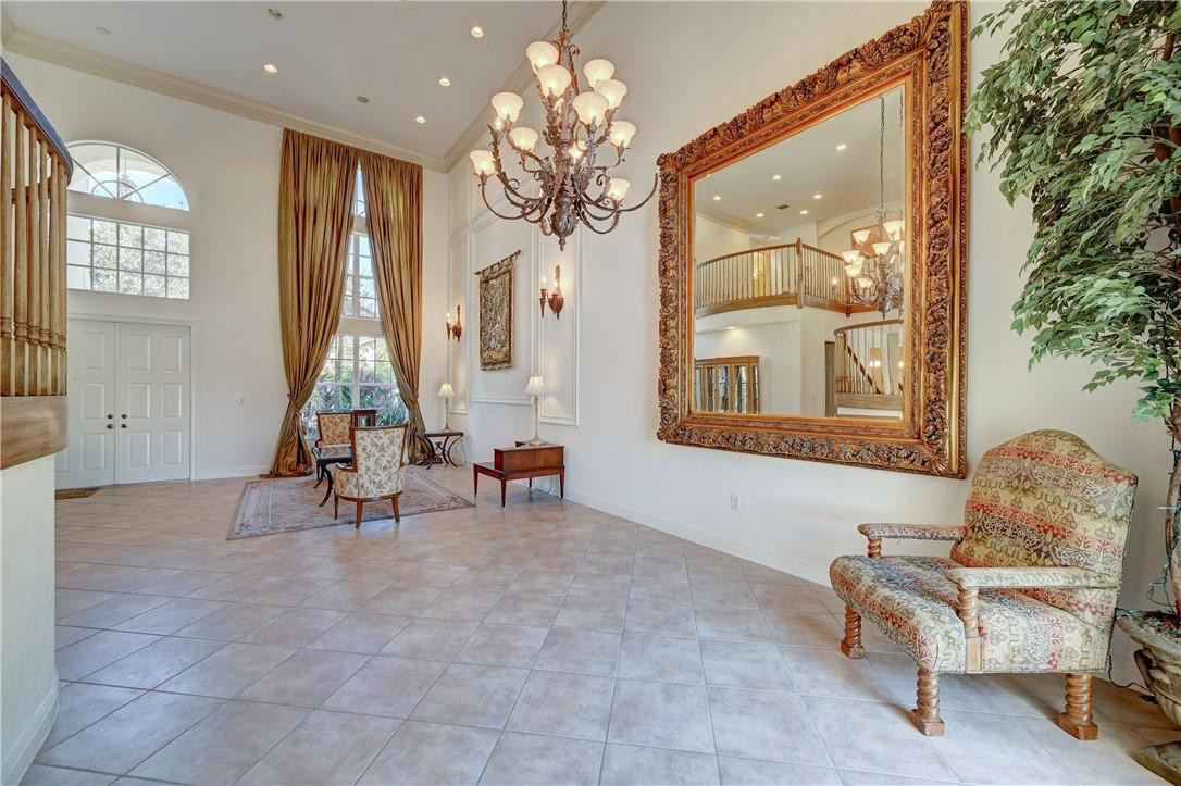 19168 Skyridge Circle Boca Raton, FL 33498 - Photo 6 of 55 a living room with furniture and a large window