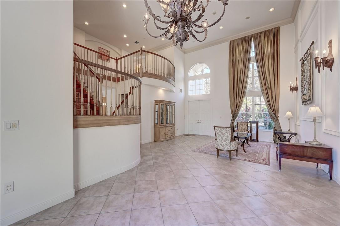 19168 Skyridge Circle Boca Raton, FL 33498 - Photo 7 of 55 a view of hall way with furniture and windows
