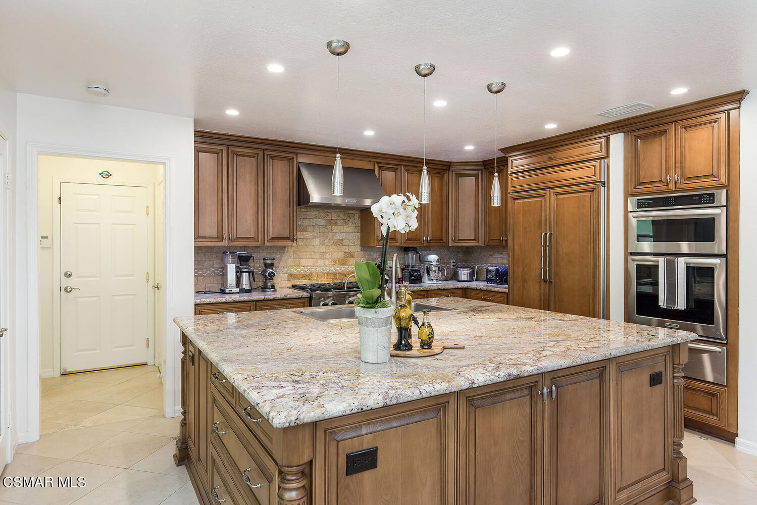 2234 Ranch View Place Thousand Oaks, CA 91362 - Photo 18 of 49 a kitchen with stainless steel appliances granite countertop a sink stove and refrigerator