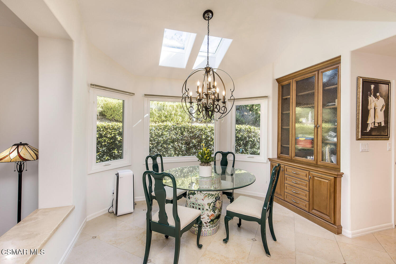 2234 Ranch View Place Thousand Oaks, CA 91362 - Photo 19 of 49 a dining room with furniture a chandelier and wooden floor
