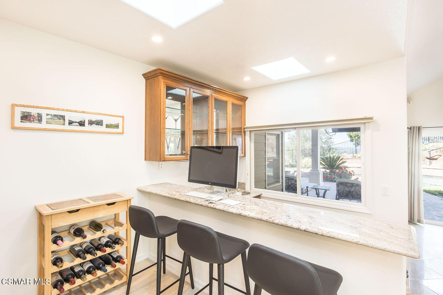 2234 Ranch View Place Thousand Oaks, CA 91362 - Photo 23 of 49 a living room with a large window and table