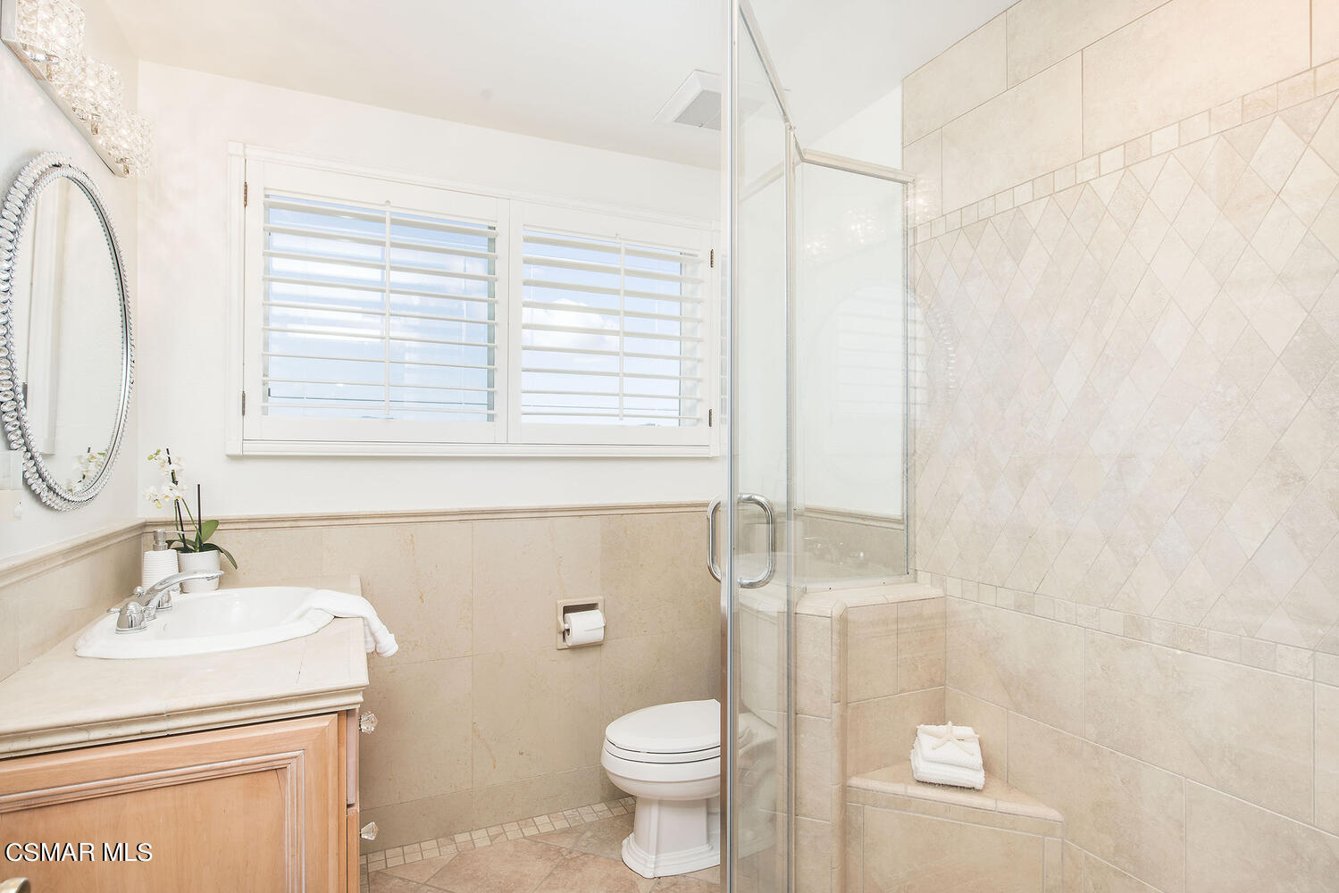 2234 Ranch View Place Thousand Oaks, CA 91362 - Photo 30 of 49 a bathroom with a sink a toilet and a mirror