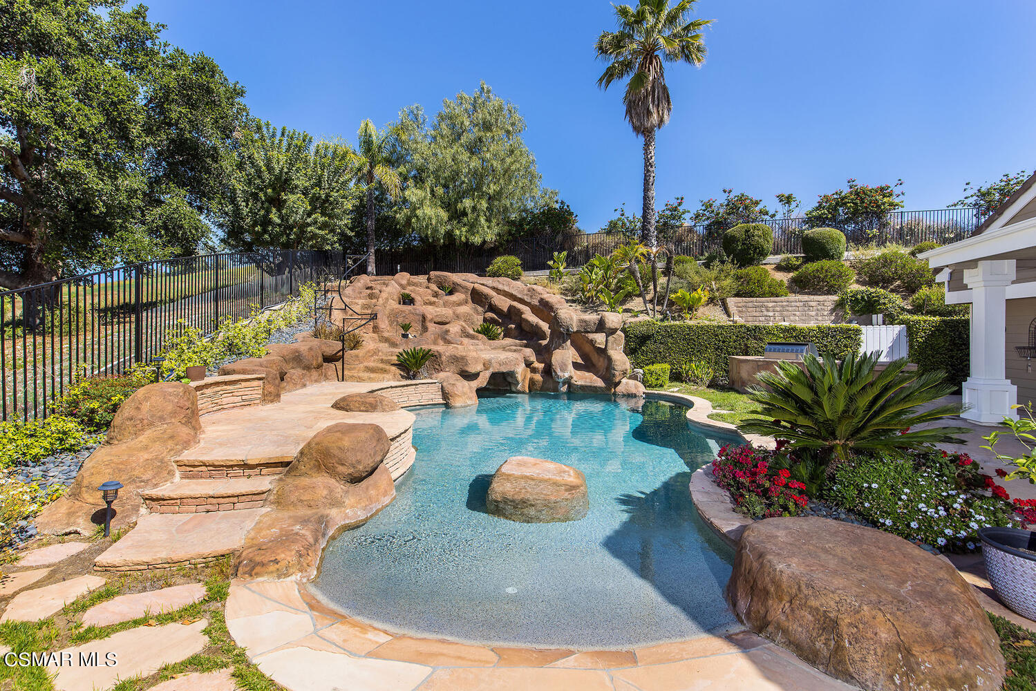 2234 Ranch View Place Thousand Oaks, CA 91362 - Photo 37 of 49 a view of a swimming pool with a patio and a yard