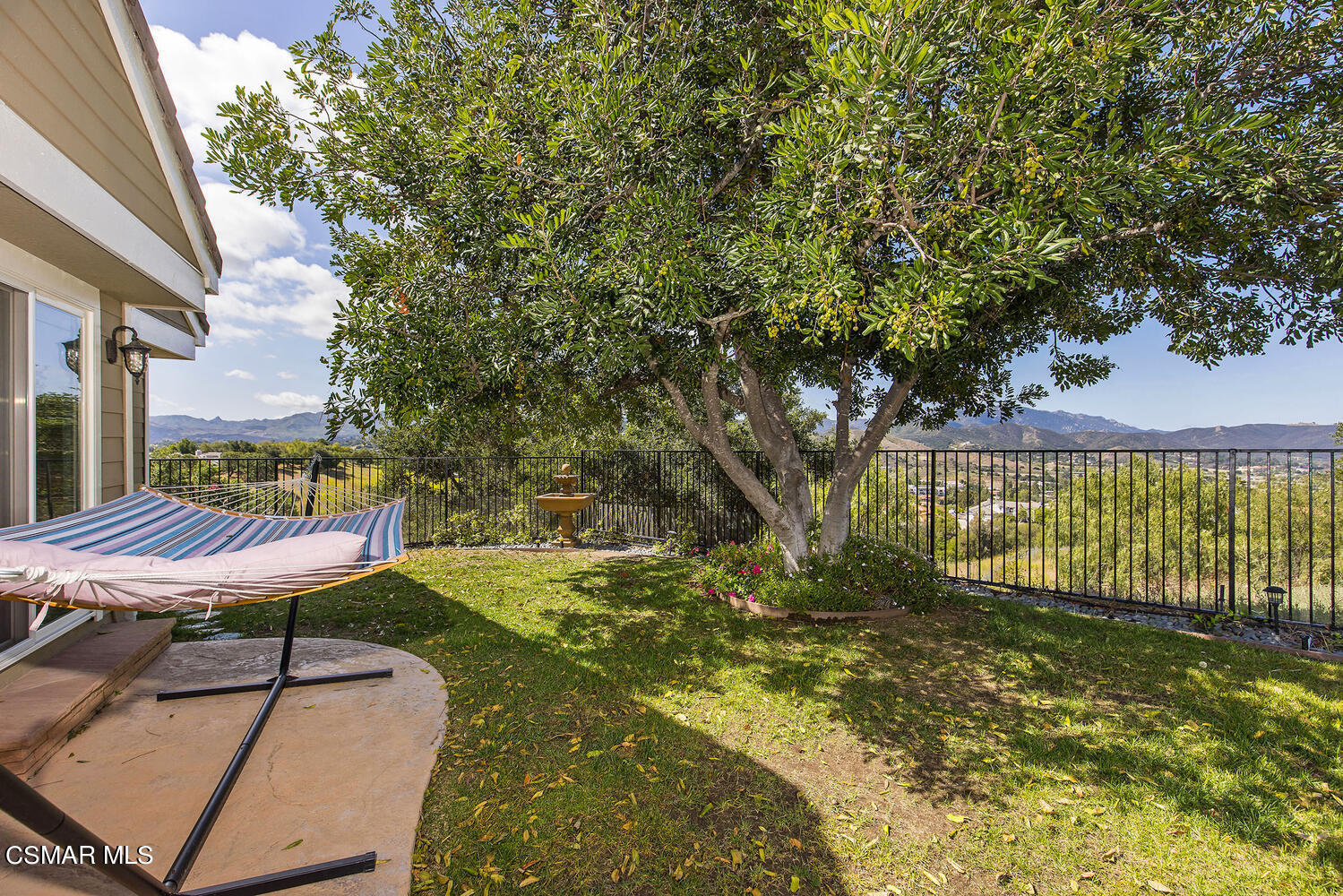 2234 Ranch View Place Thousand Oaks, CA 91362 - Photo 44 of 49 a view of a backyard with a wooden fence