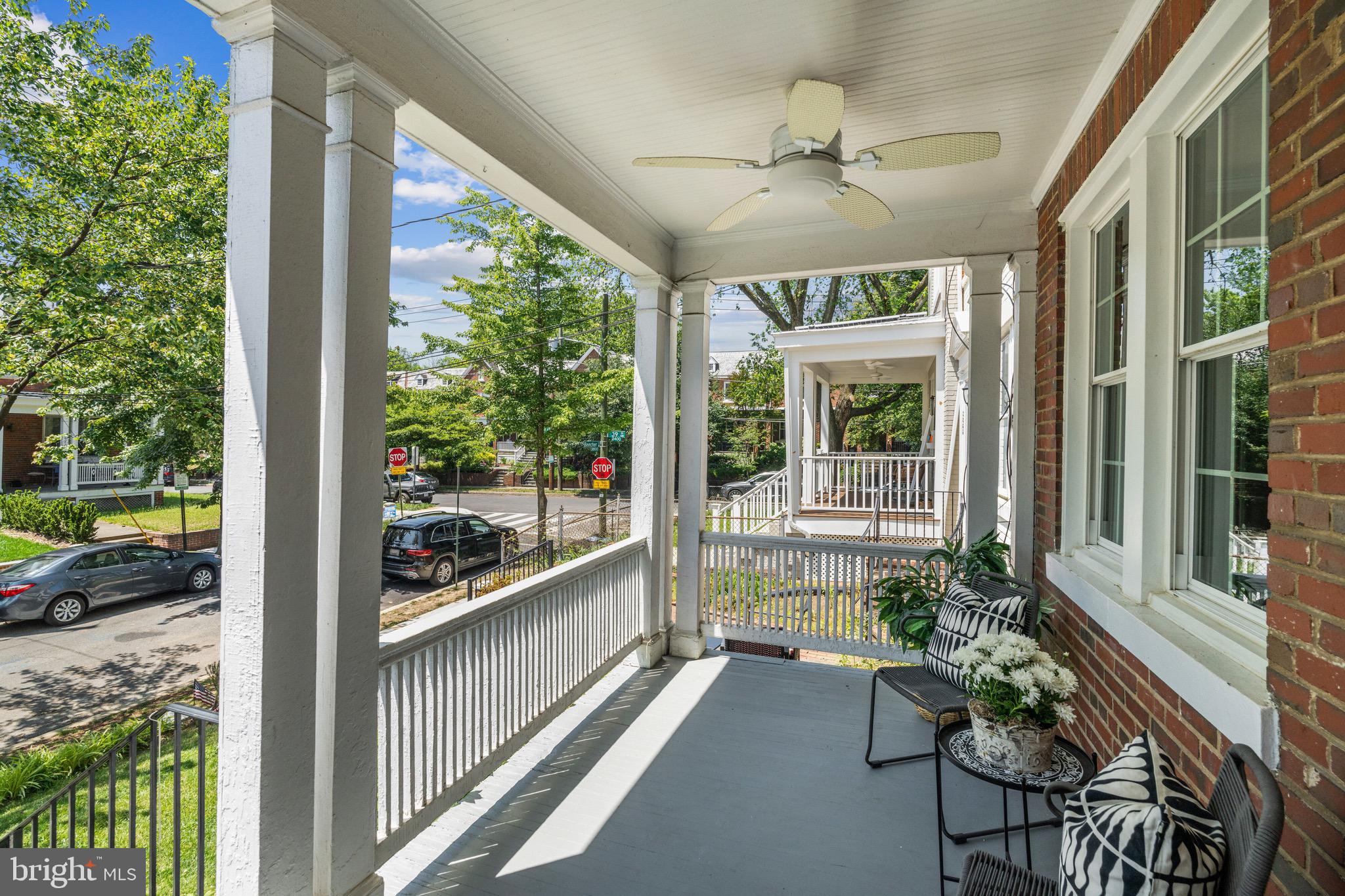 3863 Beecher Street Northwest Washington, DC 20007 - Photo 3 of 19 a view of a porch with furniture and a yard