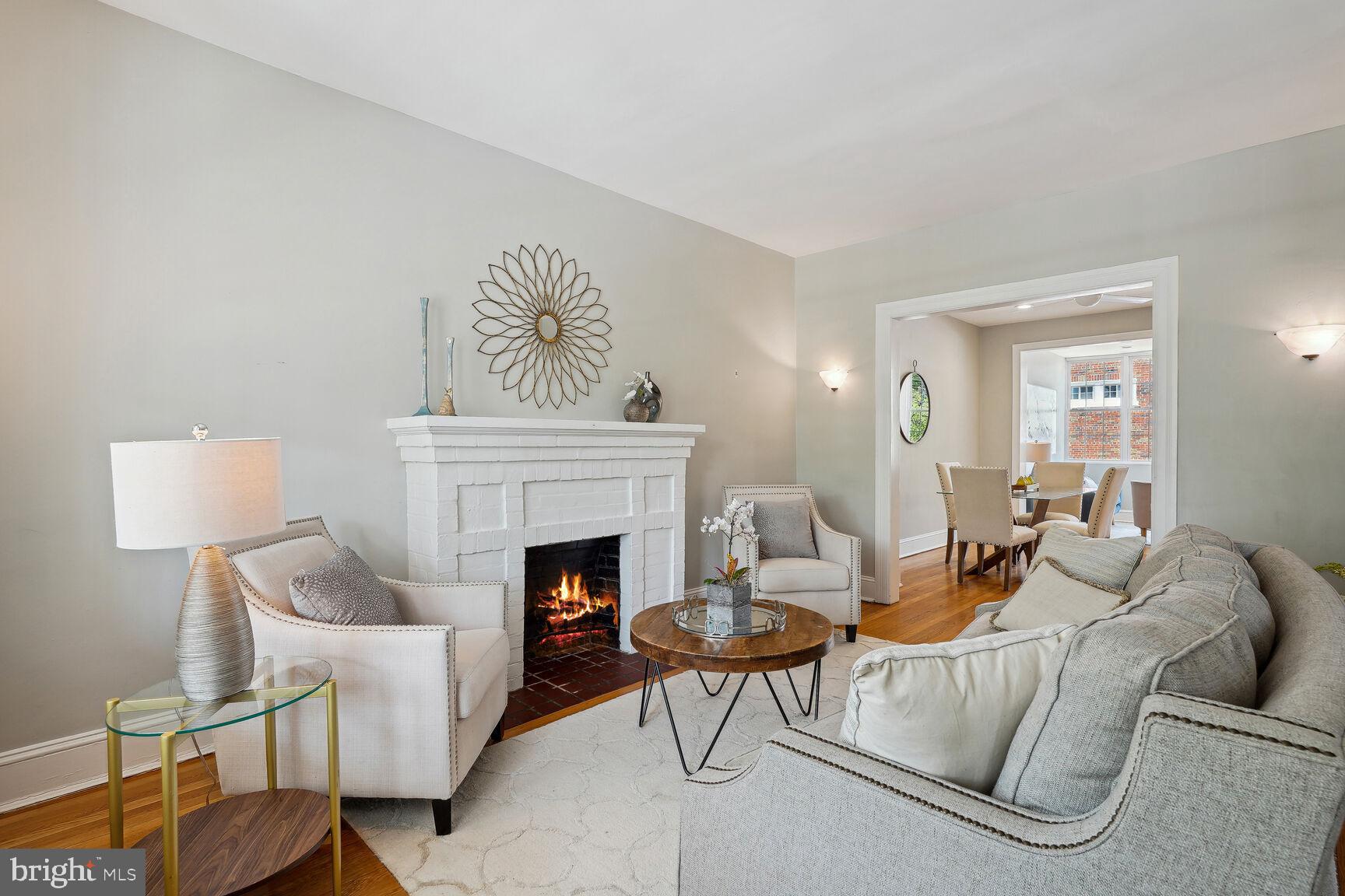 3863 Beecher Street Northwest Washington, DC 20007 - Photo 5 of 19 a living room with furniture and a fireplace